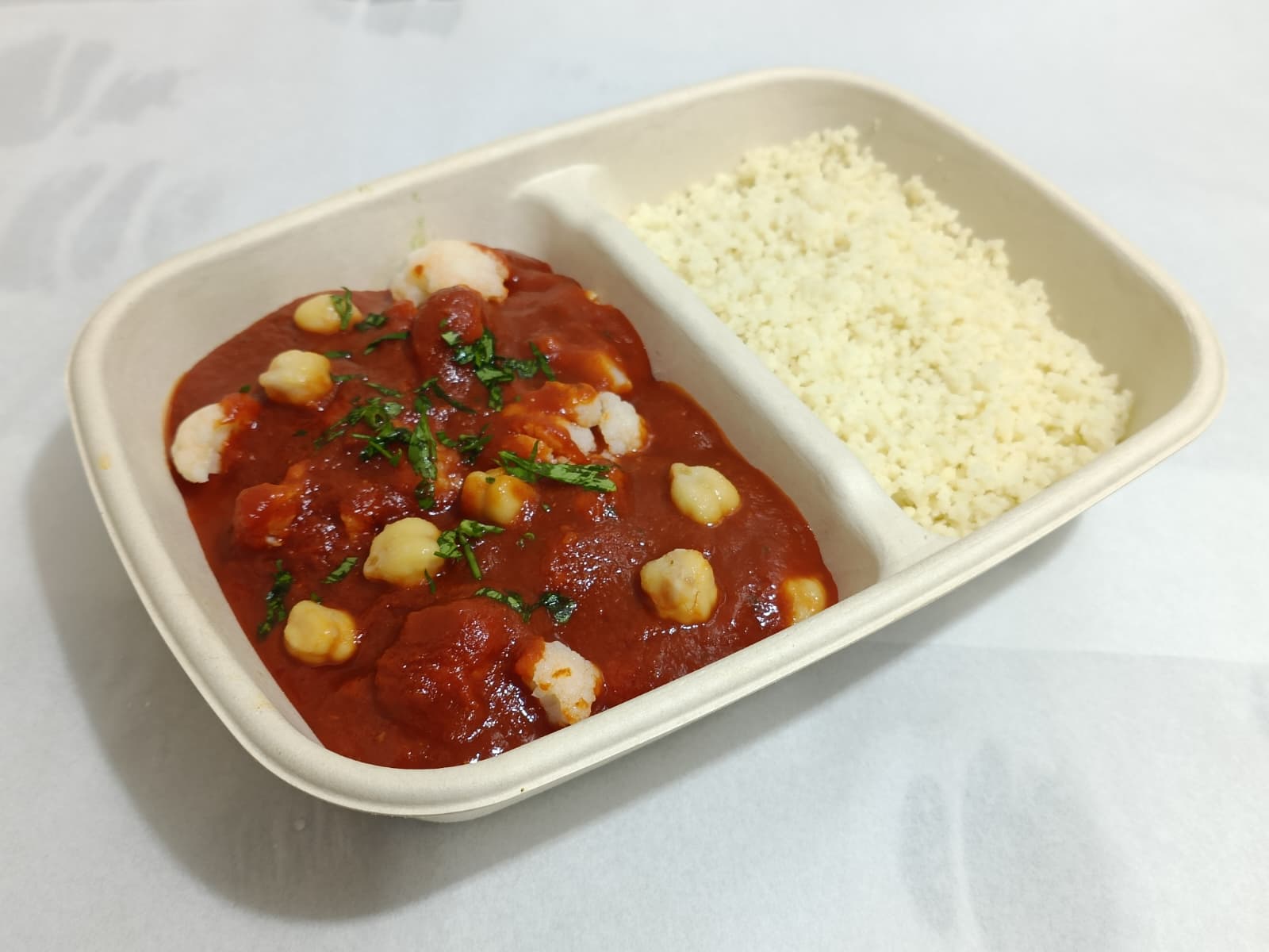 Marocan Chickipes And Cauliflower Stew With Couscous